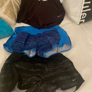 Bundle of Nike shorts. Size small. Blue black and maroon